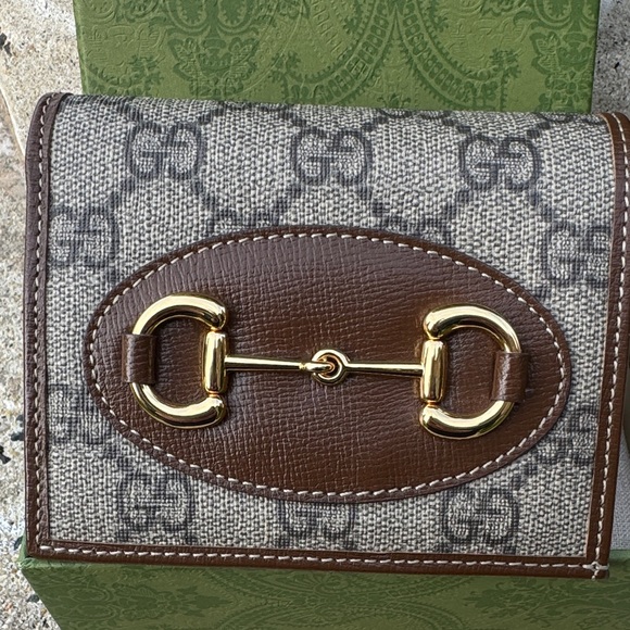 Gucci Handbags - NWOT GUCCI 1955 Horsebit GG Supreme Canvas & Leather Compact Wallet (Brown/Gold)